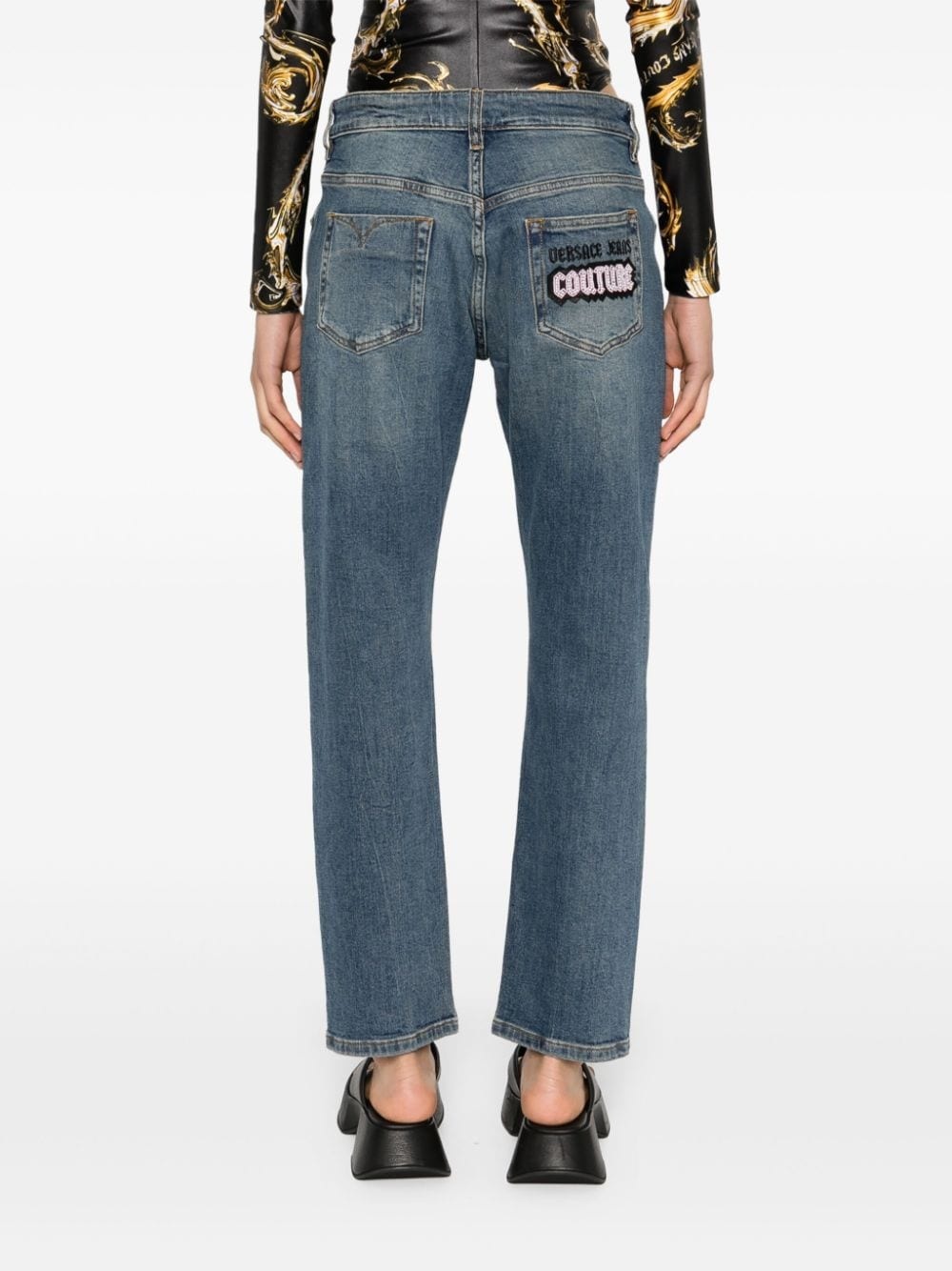 logo-embroidered slim-cut jeans - 4
