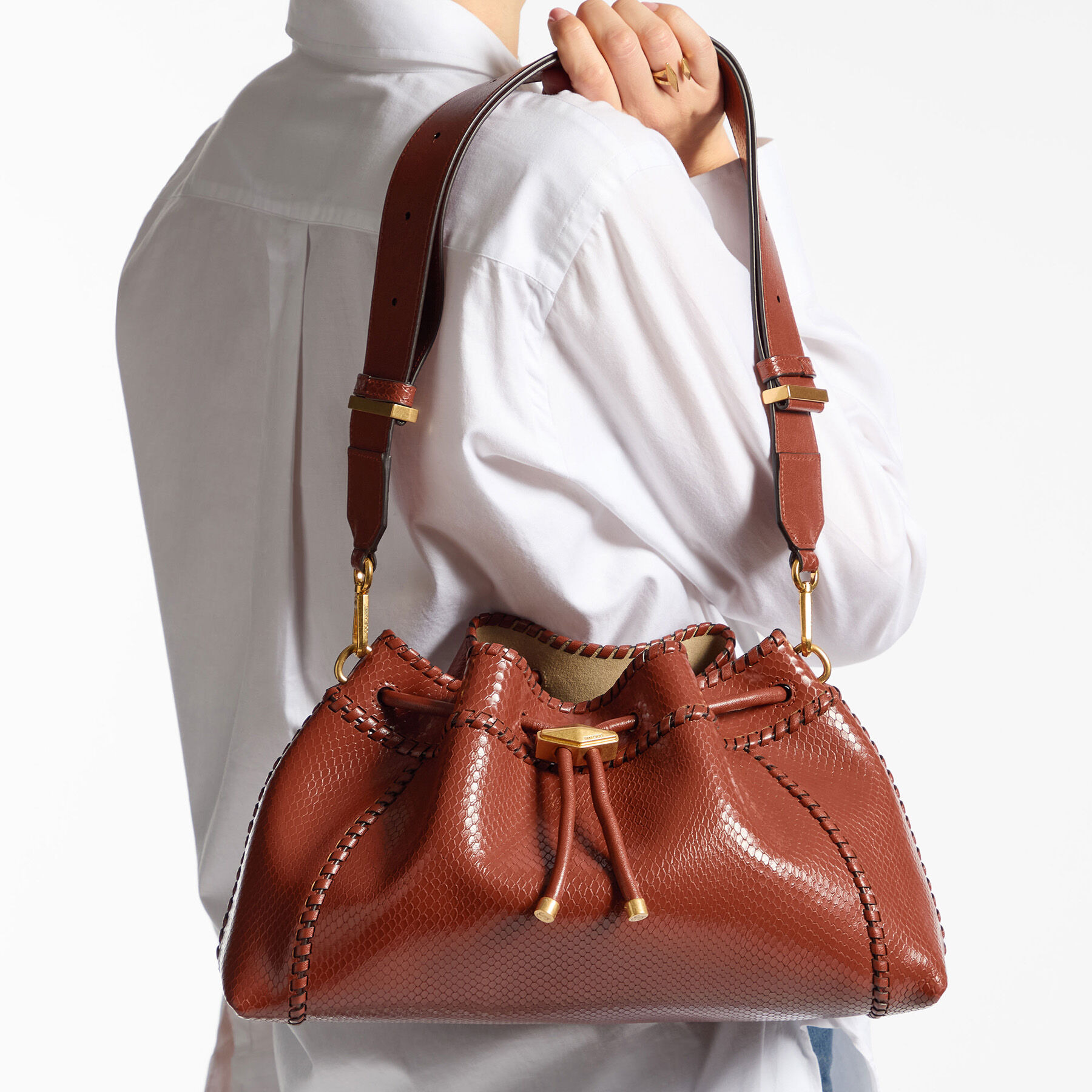 Cinch M
Cognac Elaphe Printed Leather Bucket Bag with Biker Leather Whipstitching - 2