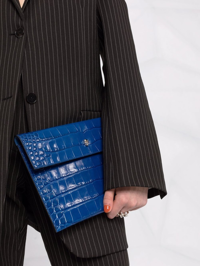 crocodile-effect skull-charm clutch bag 3