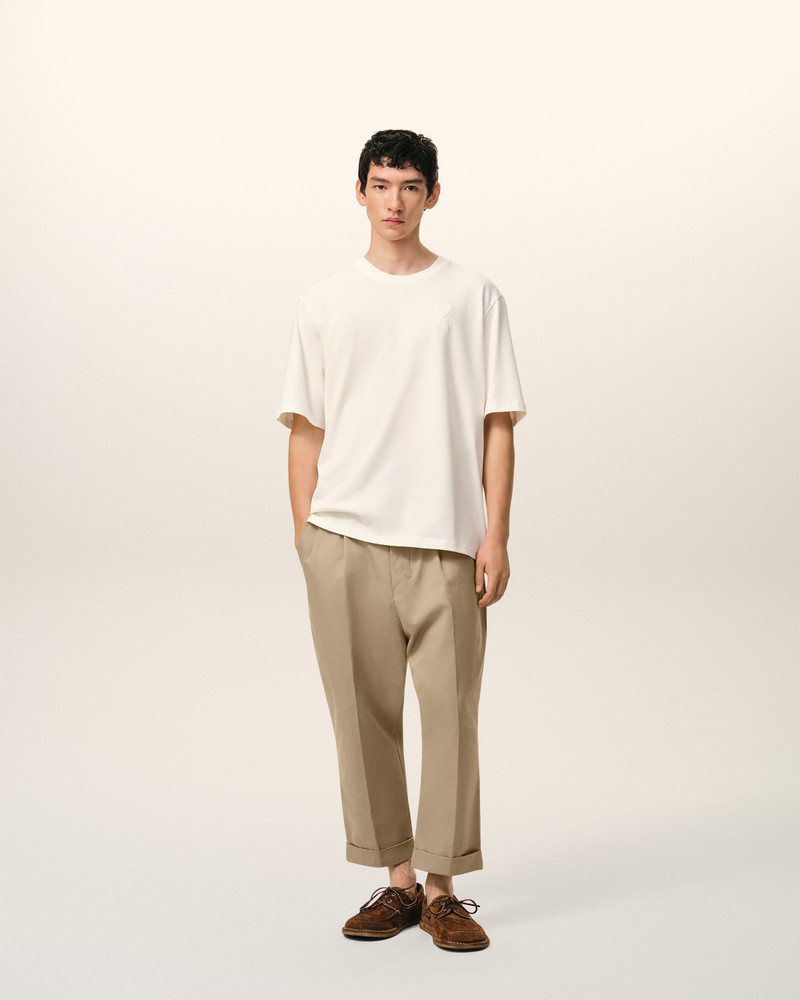 AMI Paris BEIGE COTTON CARROT OVERSIZED TROUSERS outlook
