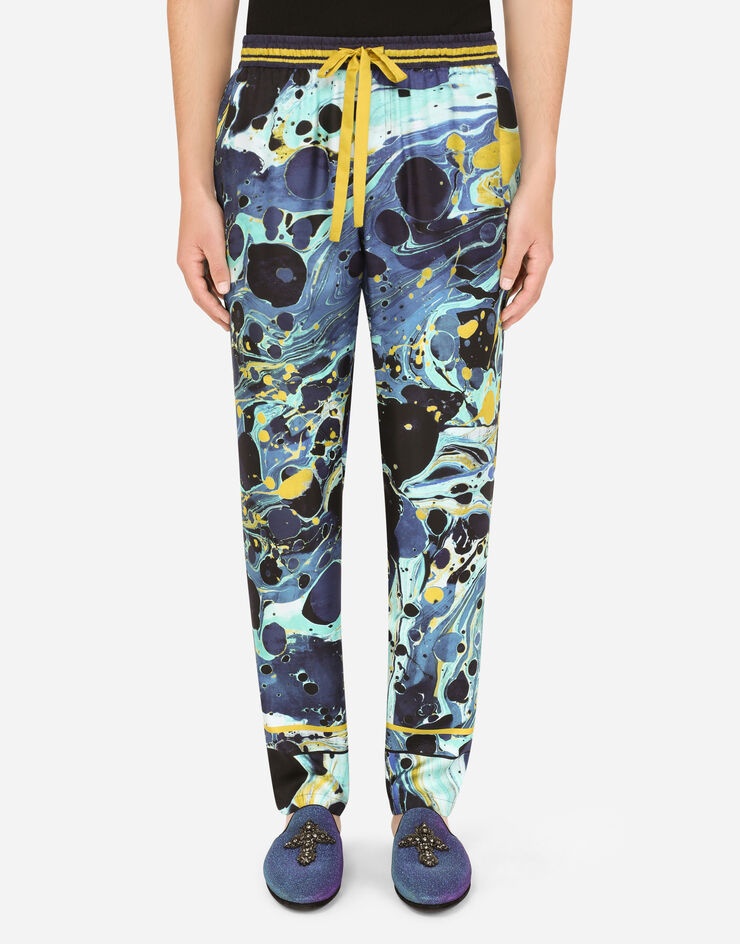 Silk jogging pants with blue marbled print - 1