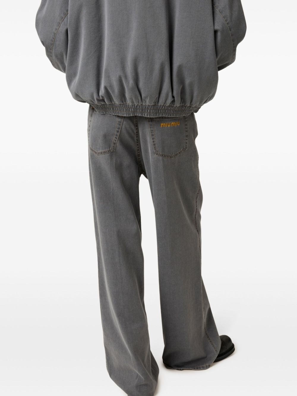 logo-embroidered wide-leg jeans - 4