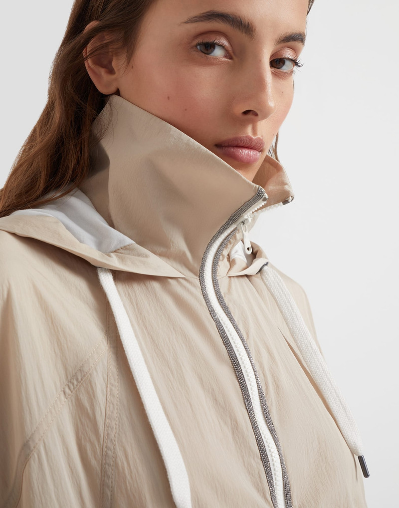 Wrinkled cloth hooded outerwear with precious trims 3