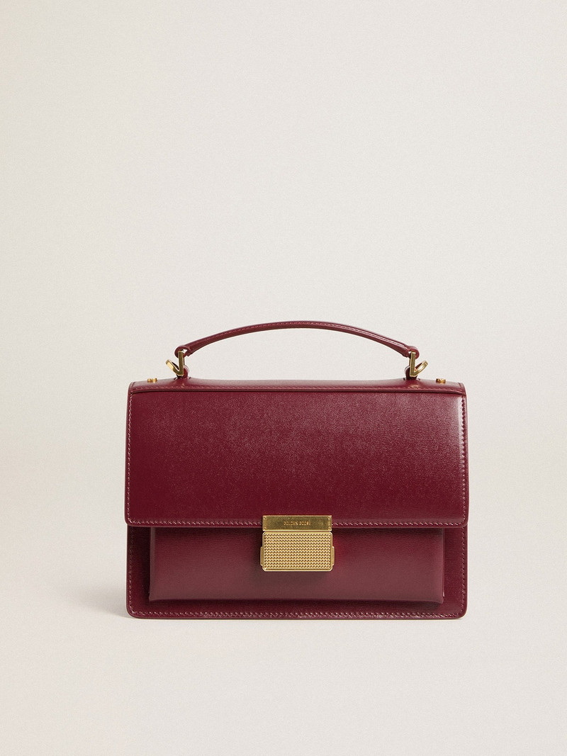 Venezia Bag in burgundy boarded leather with gold details 1