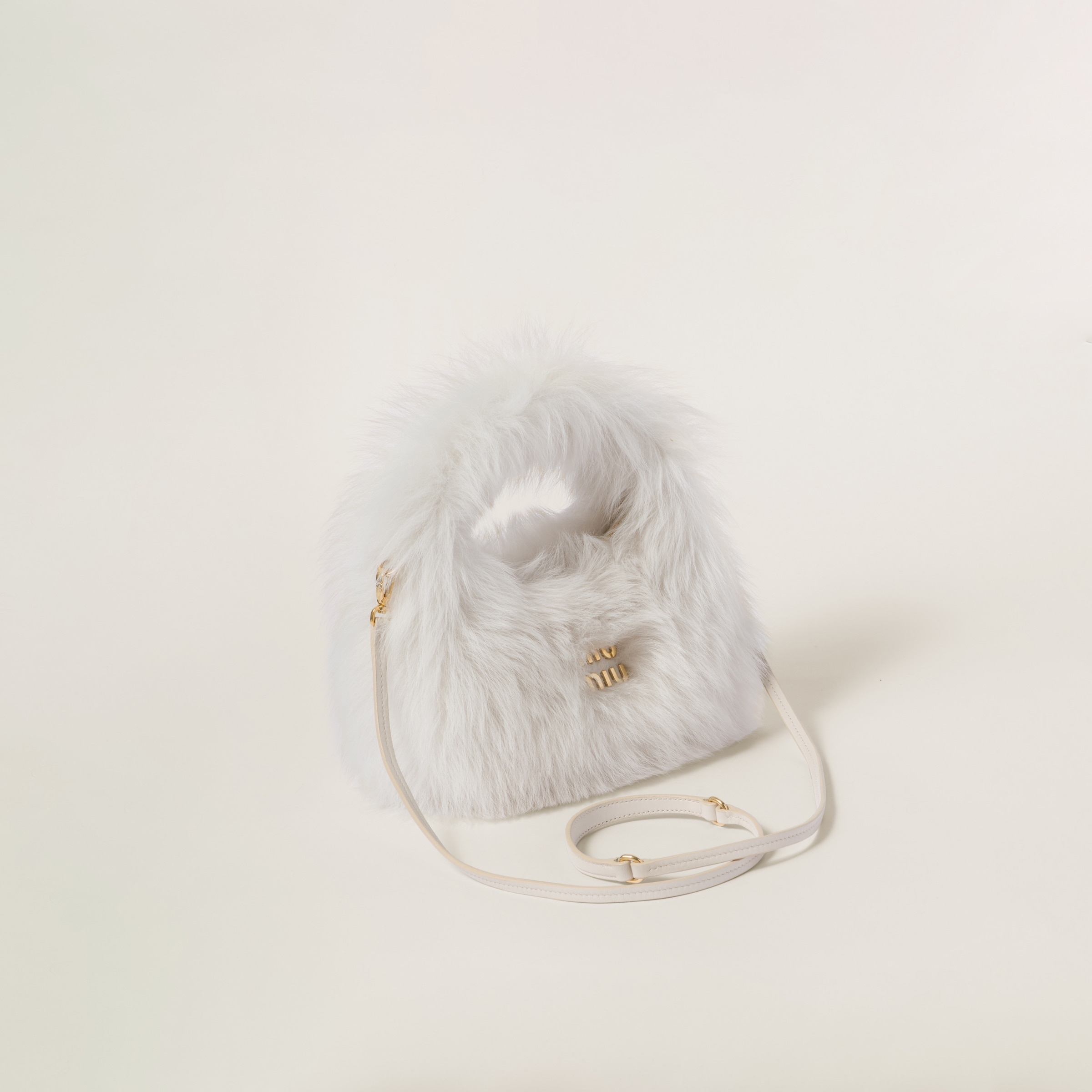 Wander shearling hobo bag with leather details - 1