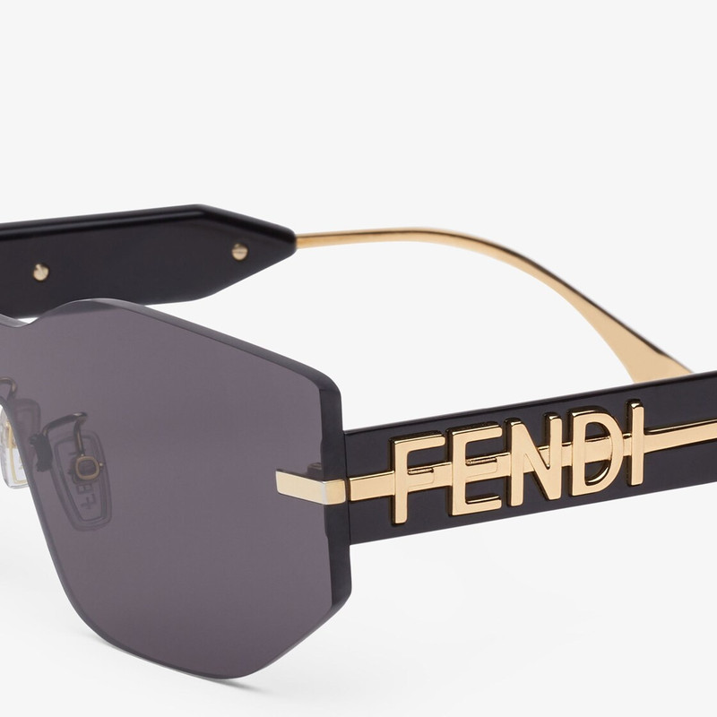 Rectangular Fendigraphy shield sunglasses inspired by the Hobo bag. Temples with in-line gold-colore 3