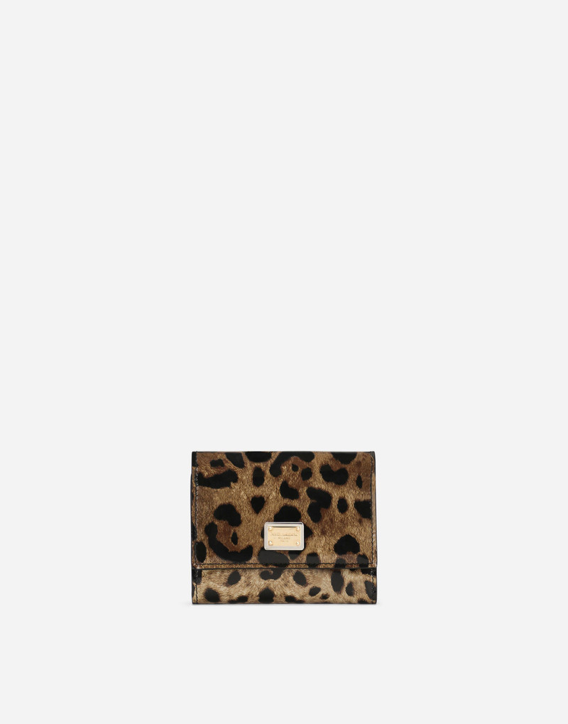 Polished calfskin wallet with leopard print 1
