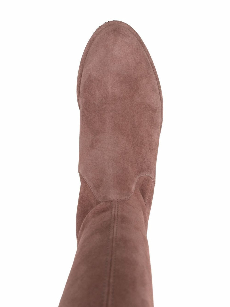 thigh-high fitted boots 4