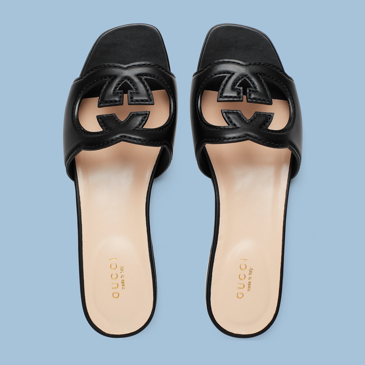 GUCCI Women's Interlocking G cut-out slide sandal | REVERSIBLE