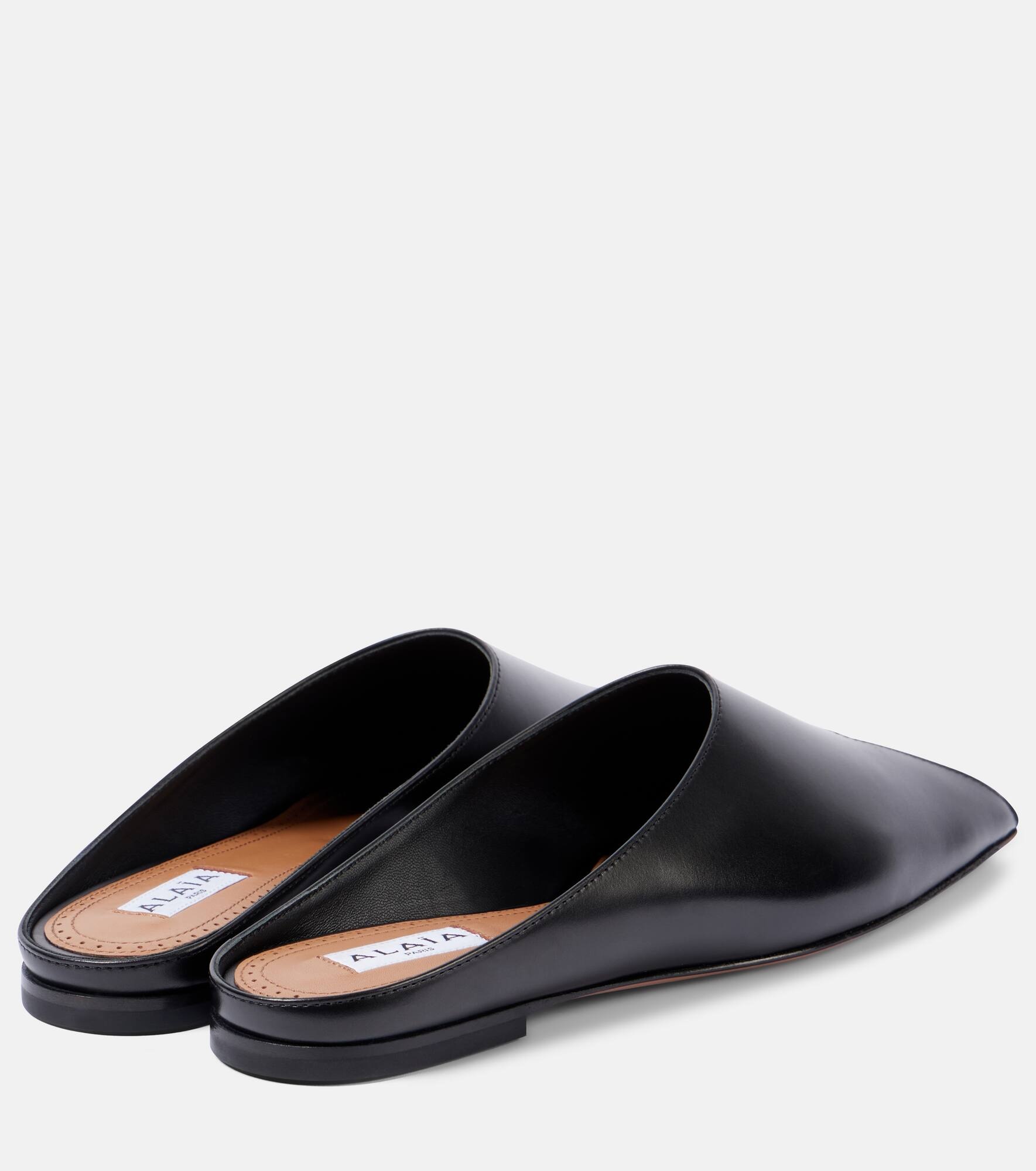 Alaïa Spike leather mules | mytheresa | REVERSIBLE