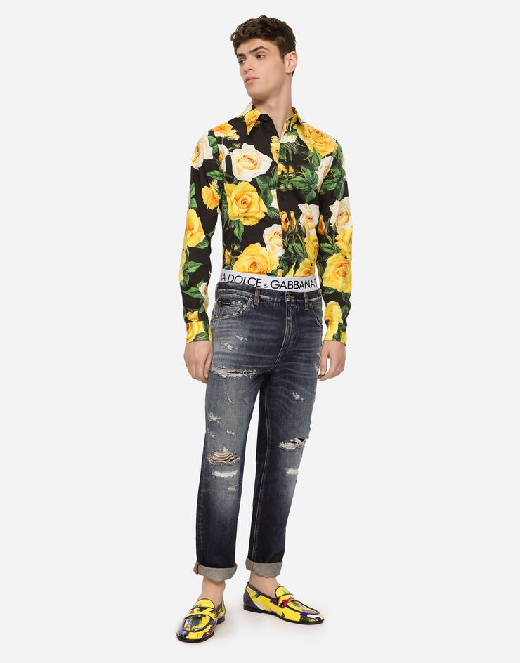 Loose blue wash jeans with rips - 1