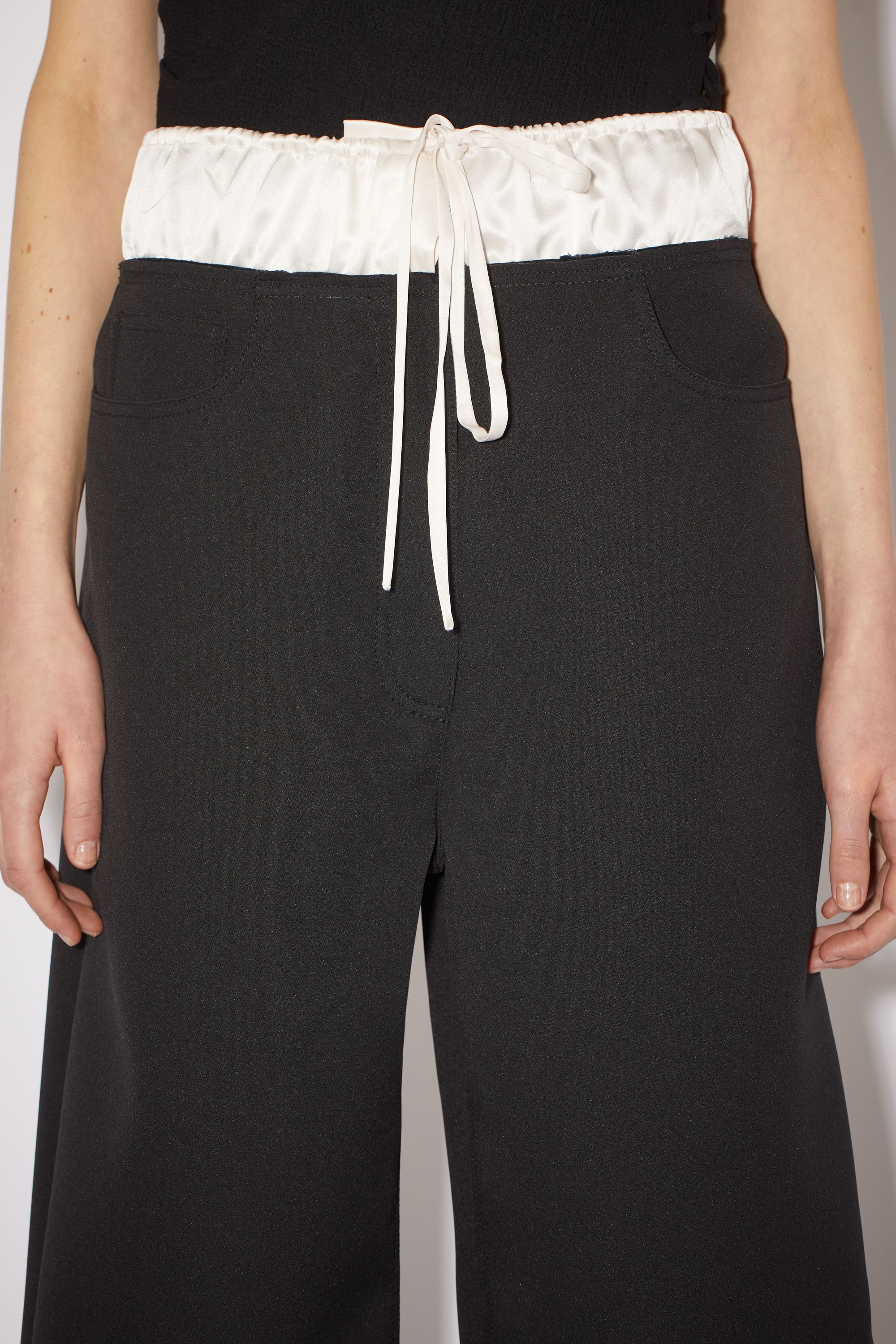 Acne Studios Satin contrast trousers - Black | REVERSIBLE