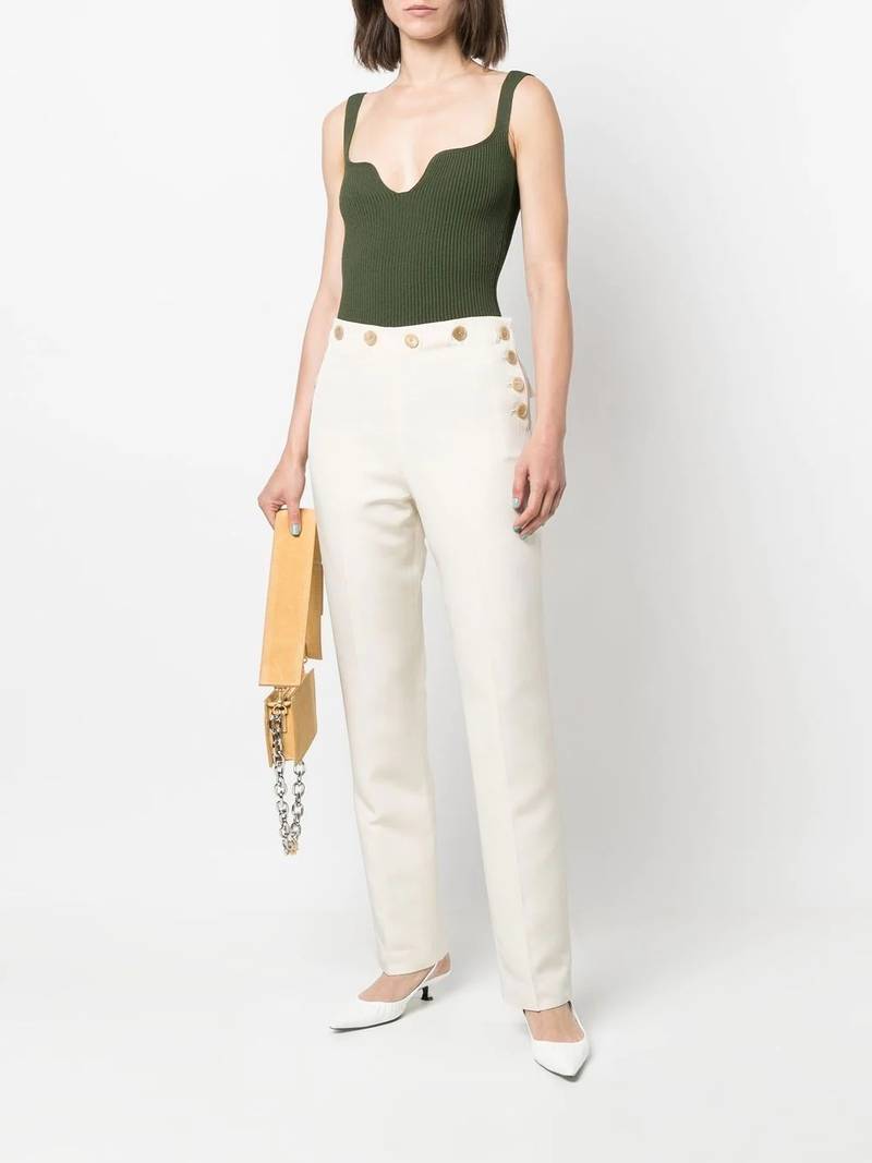KHAITE high-waist silk trousers outlook