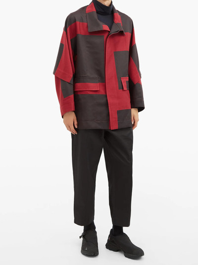 ISSEY MIYAKE Geometric-panel twill overcoat outlook