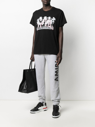 AMIRI paint splatter logo trackpants outlook