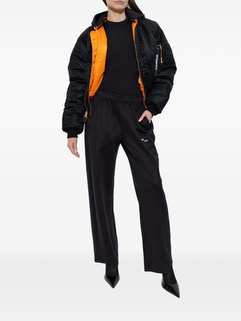 VETEMENTS logo-print track pants outlook