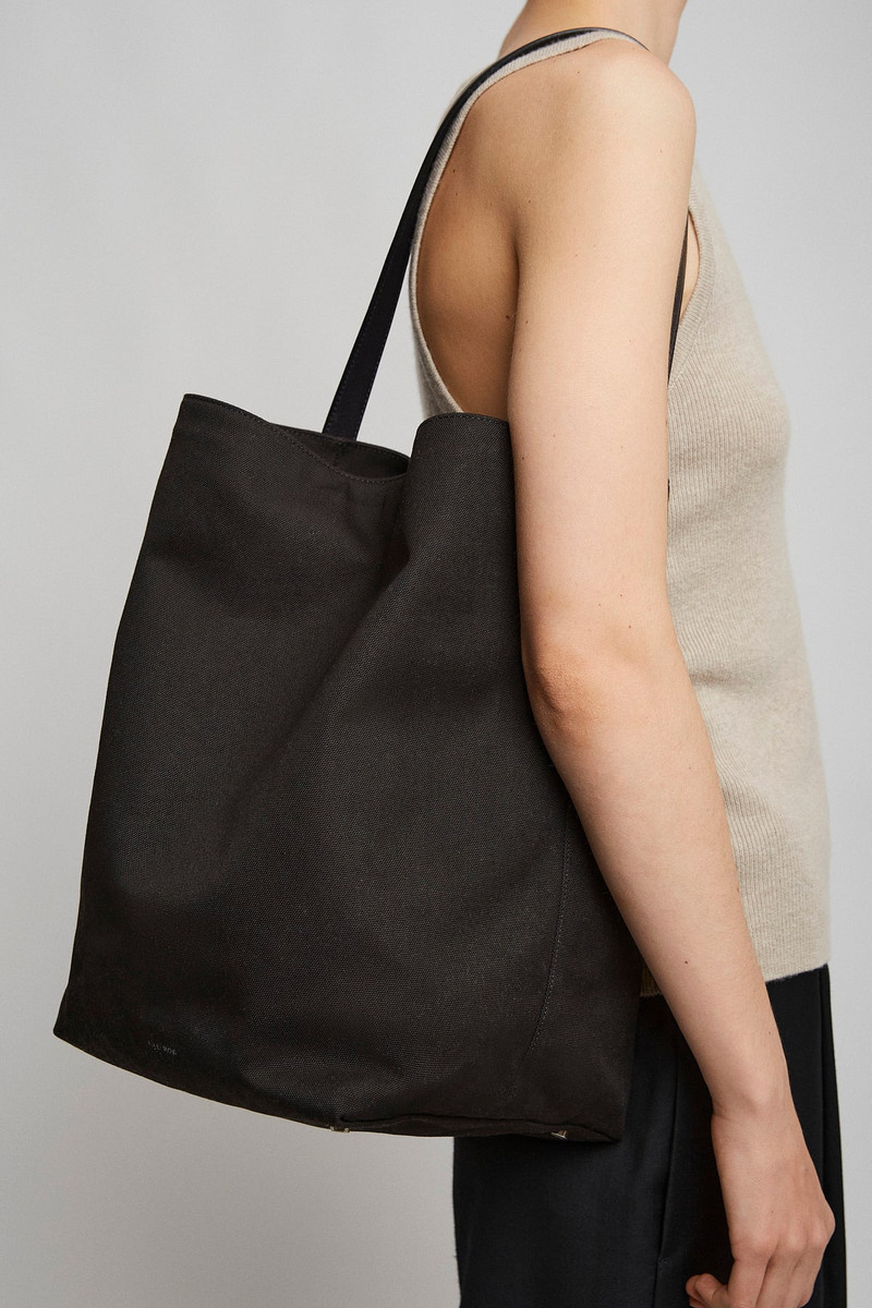 The Row Large N/S black canvas tote bag outlook