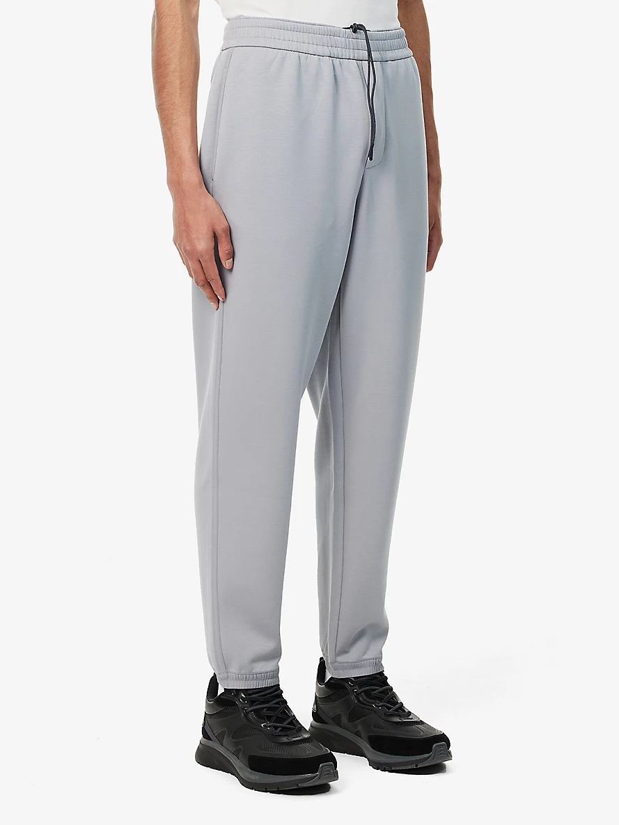 Logo-patch relaxed-fit stretch-woven blend jogging bottoms - 3