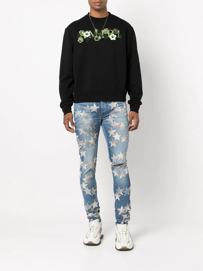 AMIRI star patch skinny jeans outlook