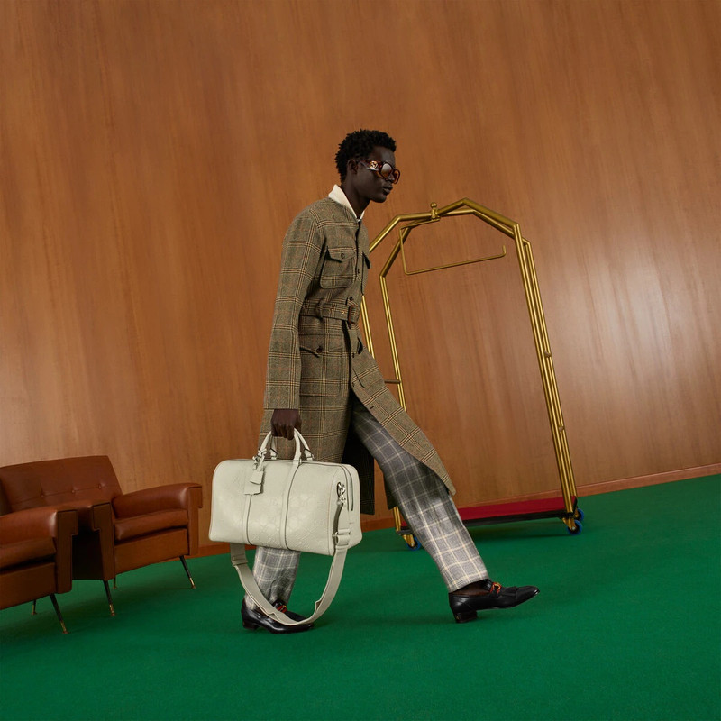 GG embossed duffle bag 4