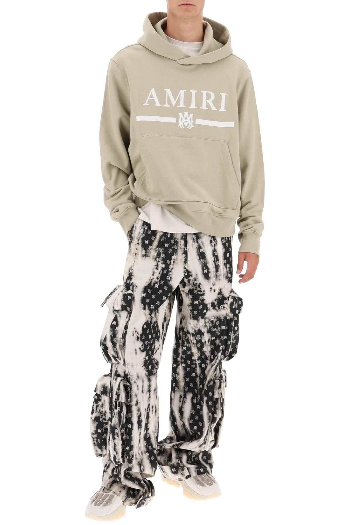 パンツ AMIRI Bleached Cargo Pants With 48 AMIRI Bleached Cargo Pants With 48