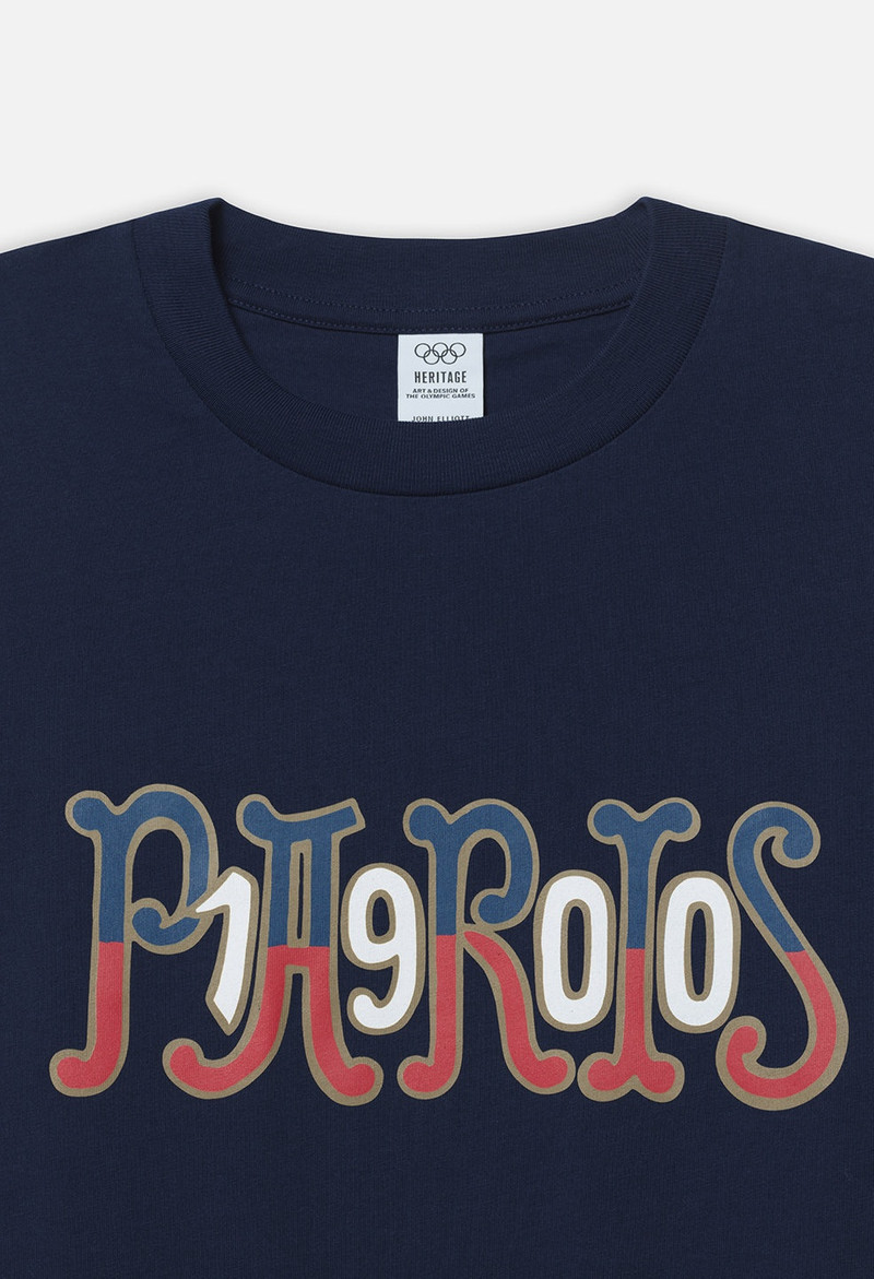 John Elliott JOHN ELLIOTT X OLYMPIC HERITAGE PARIS UNIVERSITY TEE outlook