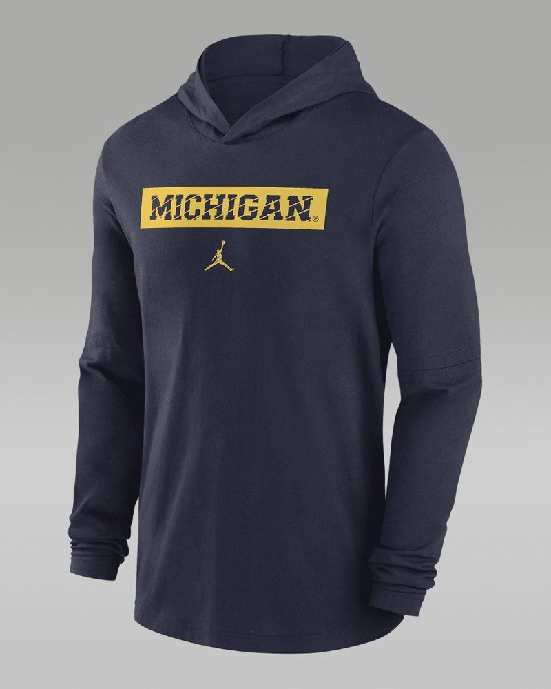 Michigan Wolverines Sideline Men's Jordan Dri-FIT College Long-Sleeve Hooded Top 1