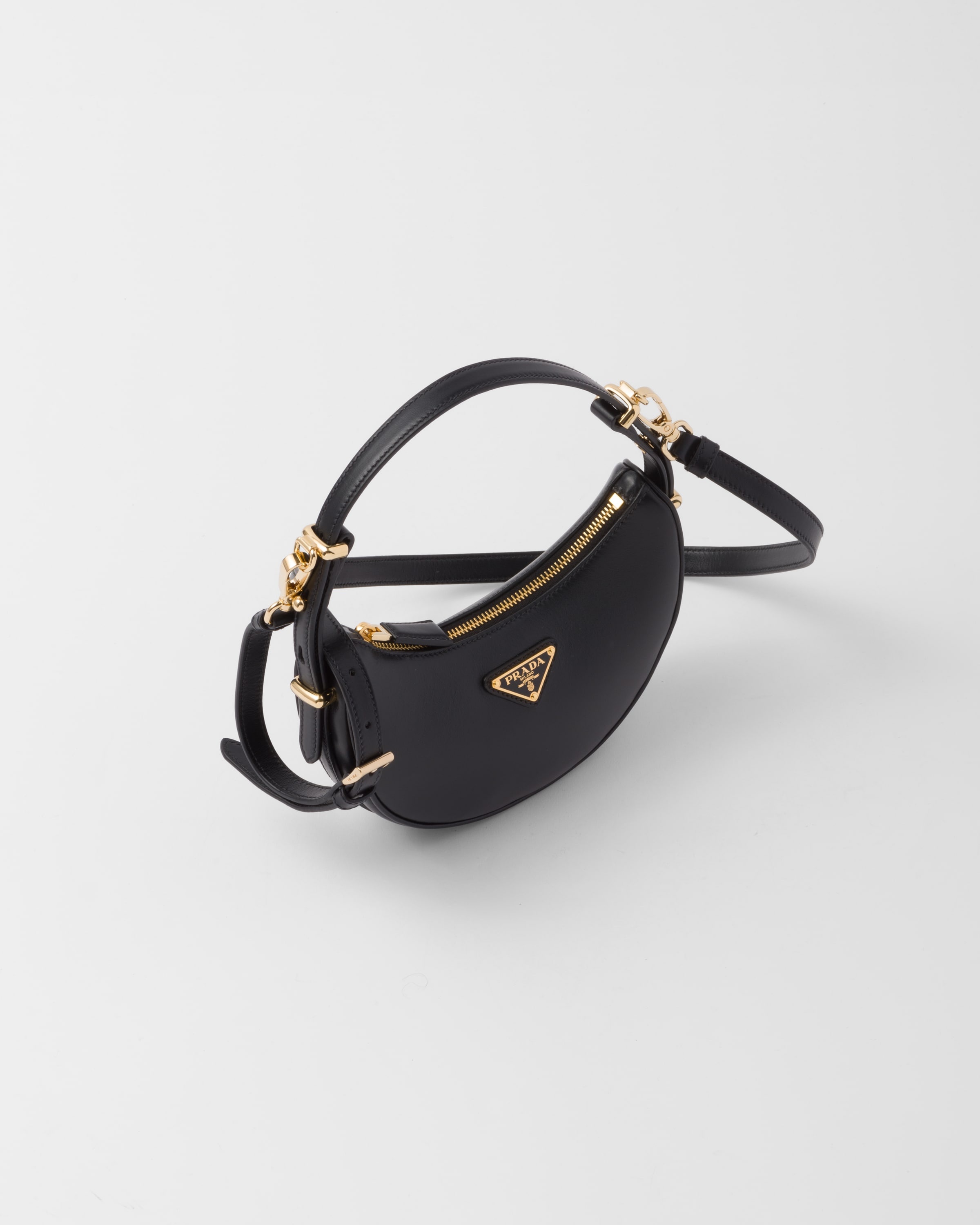 Prada Prada Arqué leather mini shoulder bag | REVERSIBLE