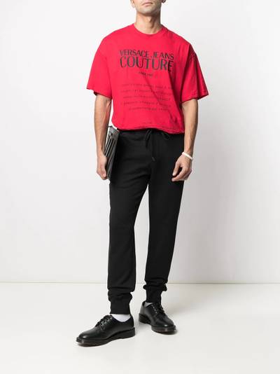 VERSACE JEANS COUTURE logo-tape track pants outlook