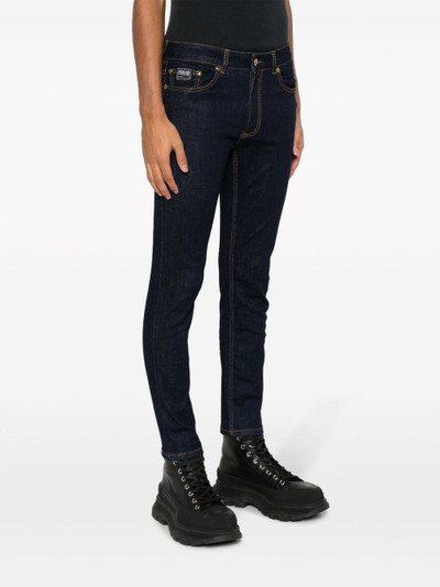 VERSACE JEANS COUTURE logo-patch skinny jeans outlook