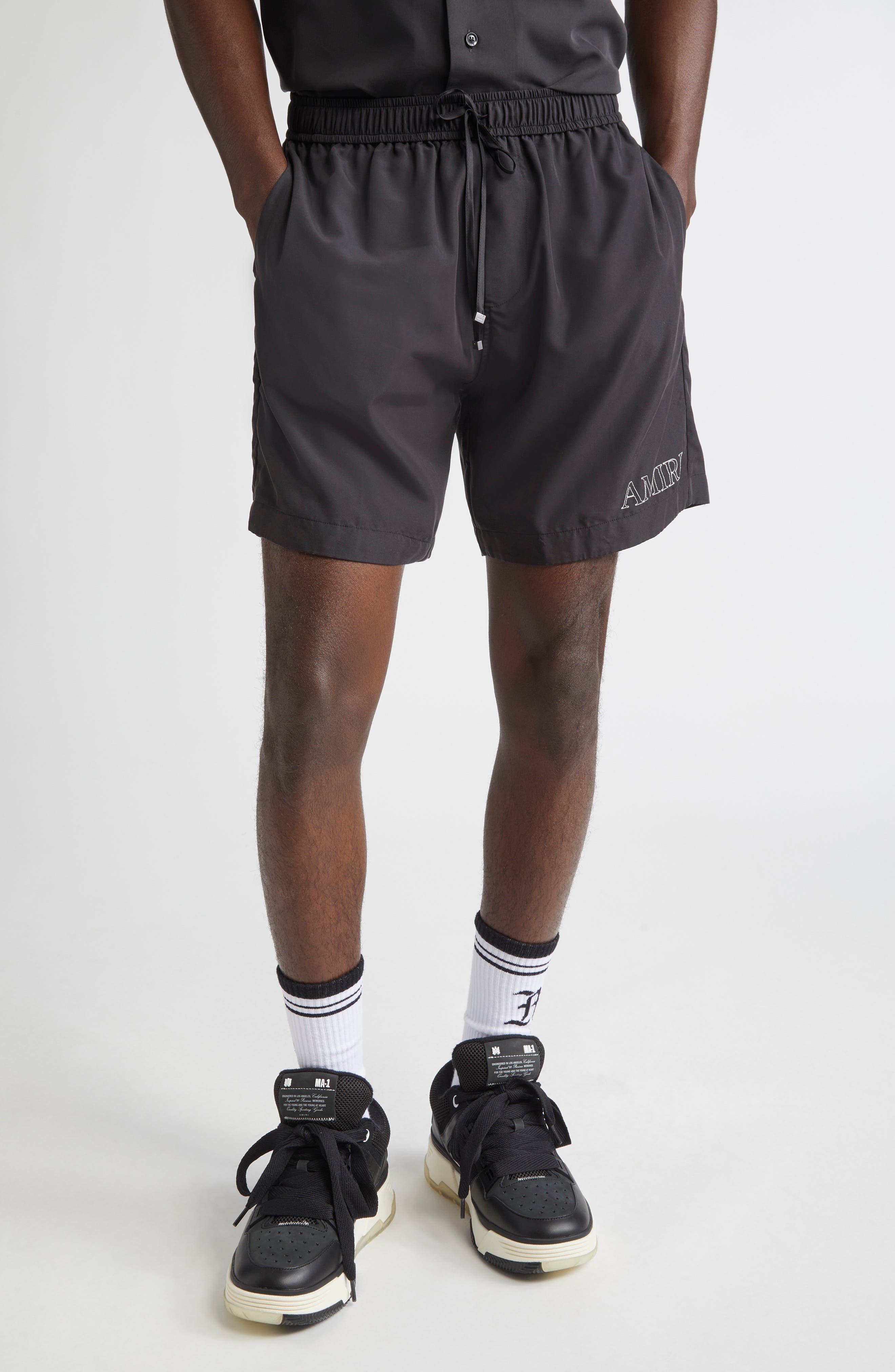 AMIRI Logo Embroidered Shorts in Black at Nordstrom - 1