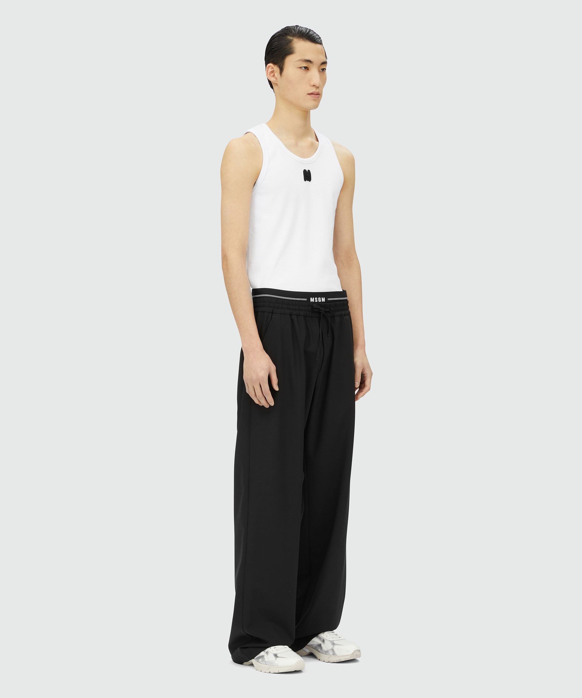 Black virgin wool pants with elastic logo - 4