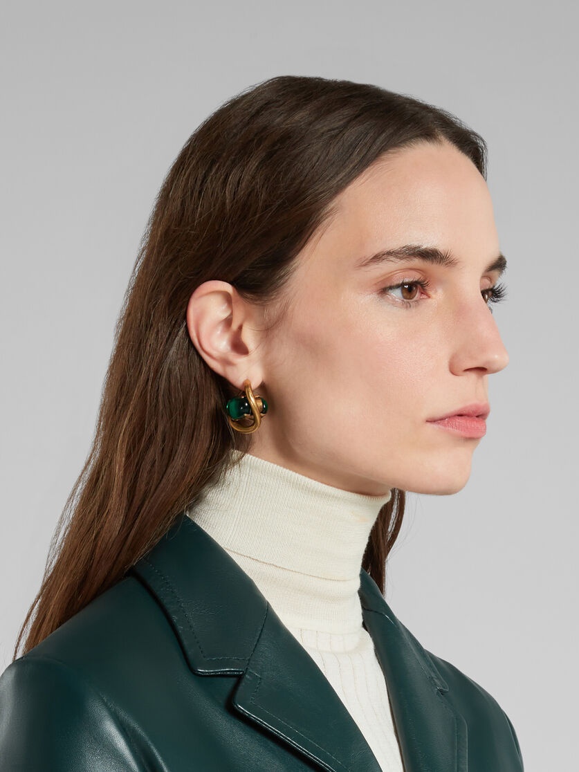 TWISTED HOOP EARRINGS WITH RESIN EYES 2