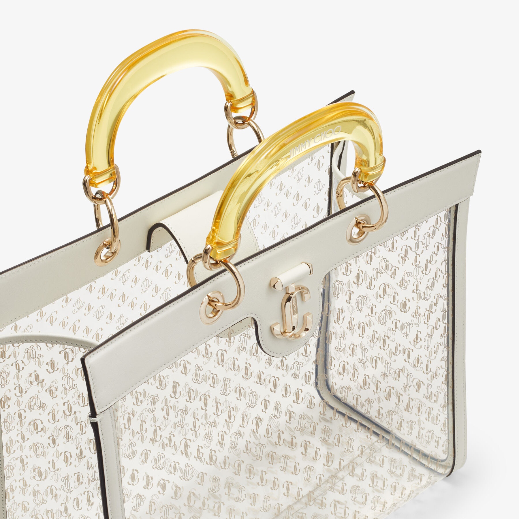 Varenne Top Handle Tote
Latte Leather Tote Bag with Yellow Plexi Handle - 5