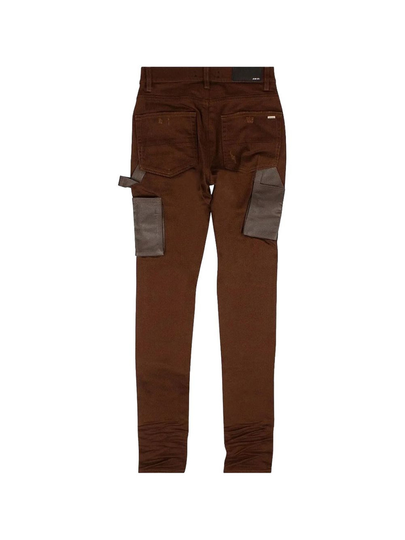AMIRI leather-detail jeans outlook