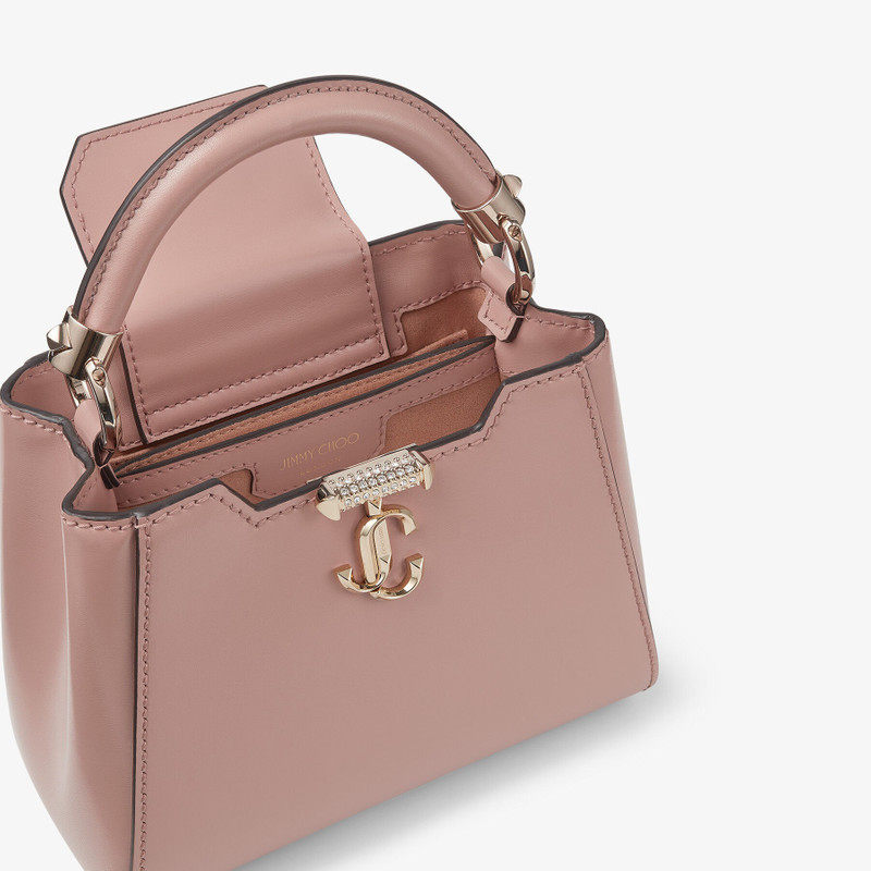 JIMMY CHOO Varenne Top Handle Mini
Ballet Pink Leather Top Handle Bag with Crystal Bar and JC Emblem outlook