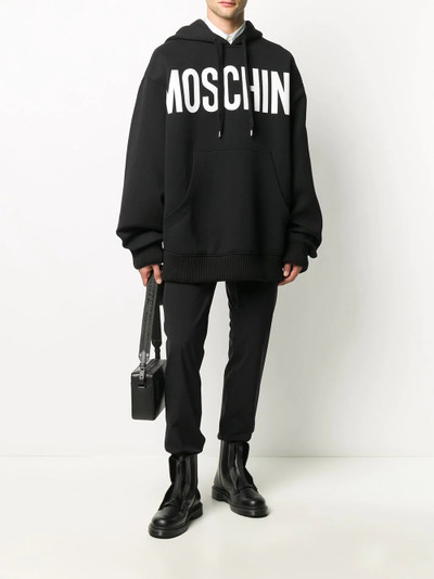 Moschino logo print oversized hoodie outlook