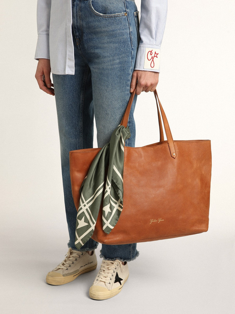 Moss green scarf with contrasting white stripes and stars 3