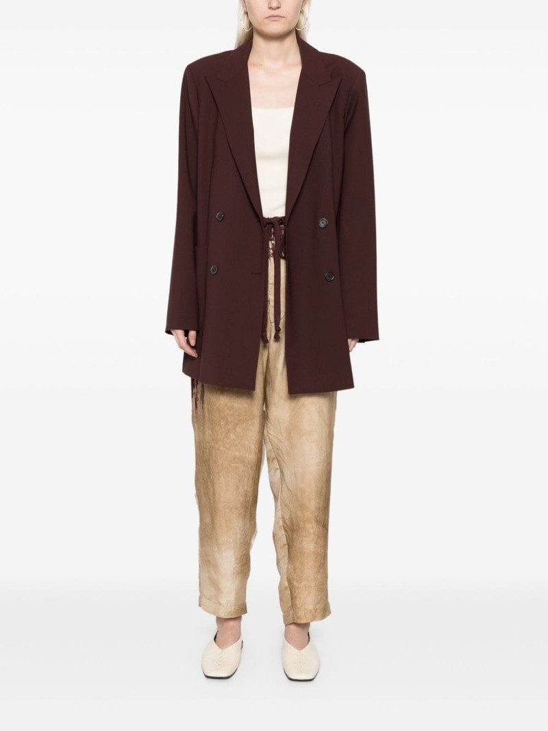 UMA WANG abstract pattern print drawstring trousers outlook