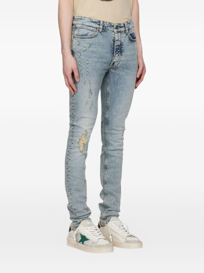 Ksubi distressed logo-patch jeans outlook