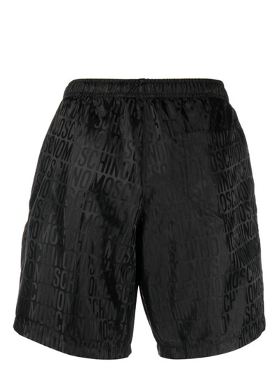 Moschino logo-print swim shorts outlook