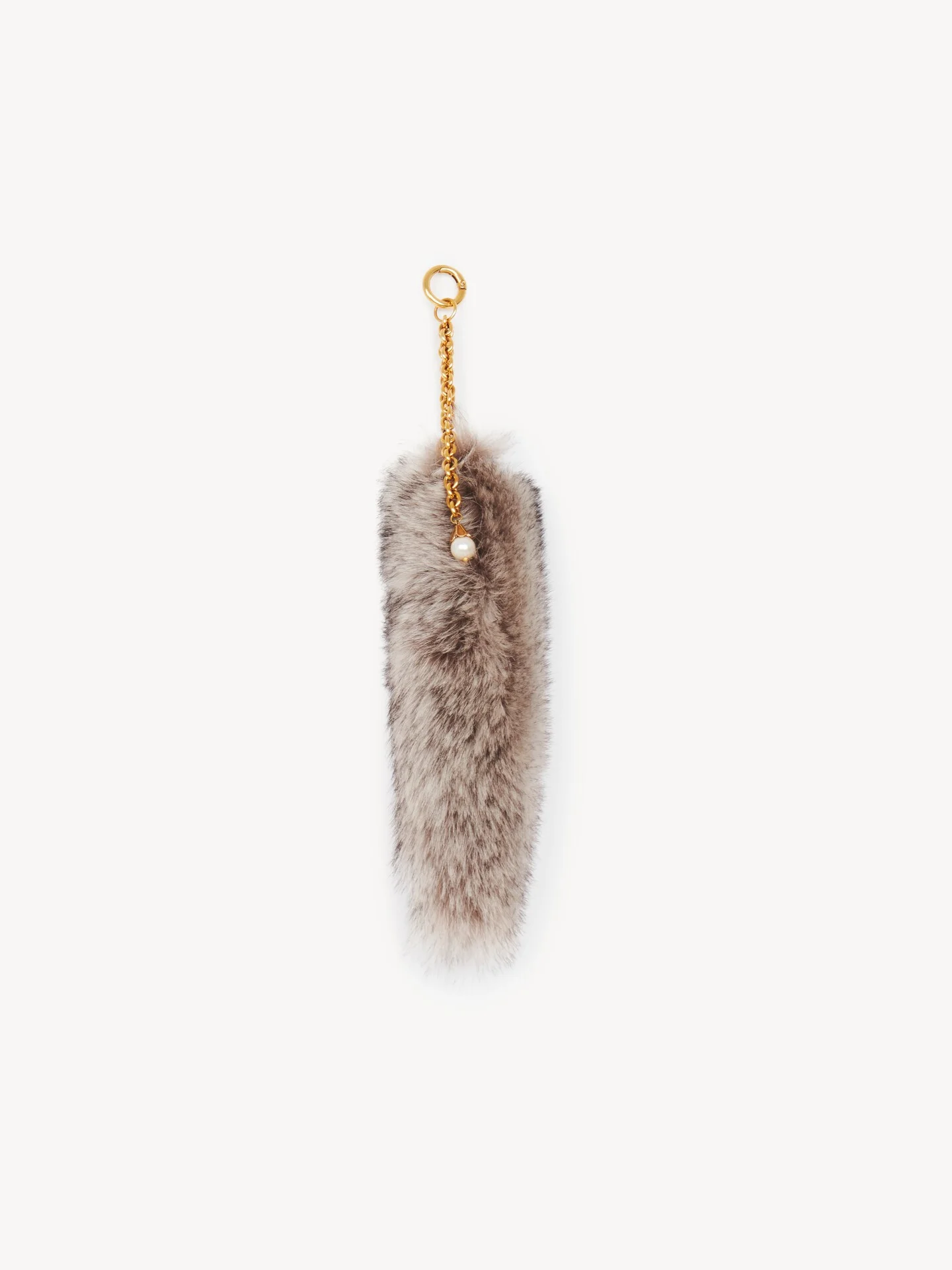 THE TREASURE TAILS CHARM IN SHEARLING - 1