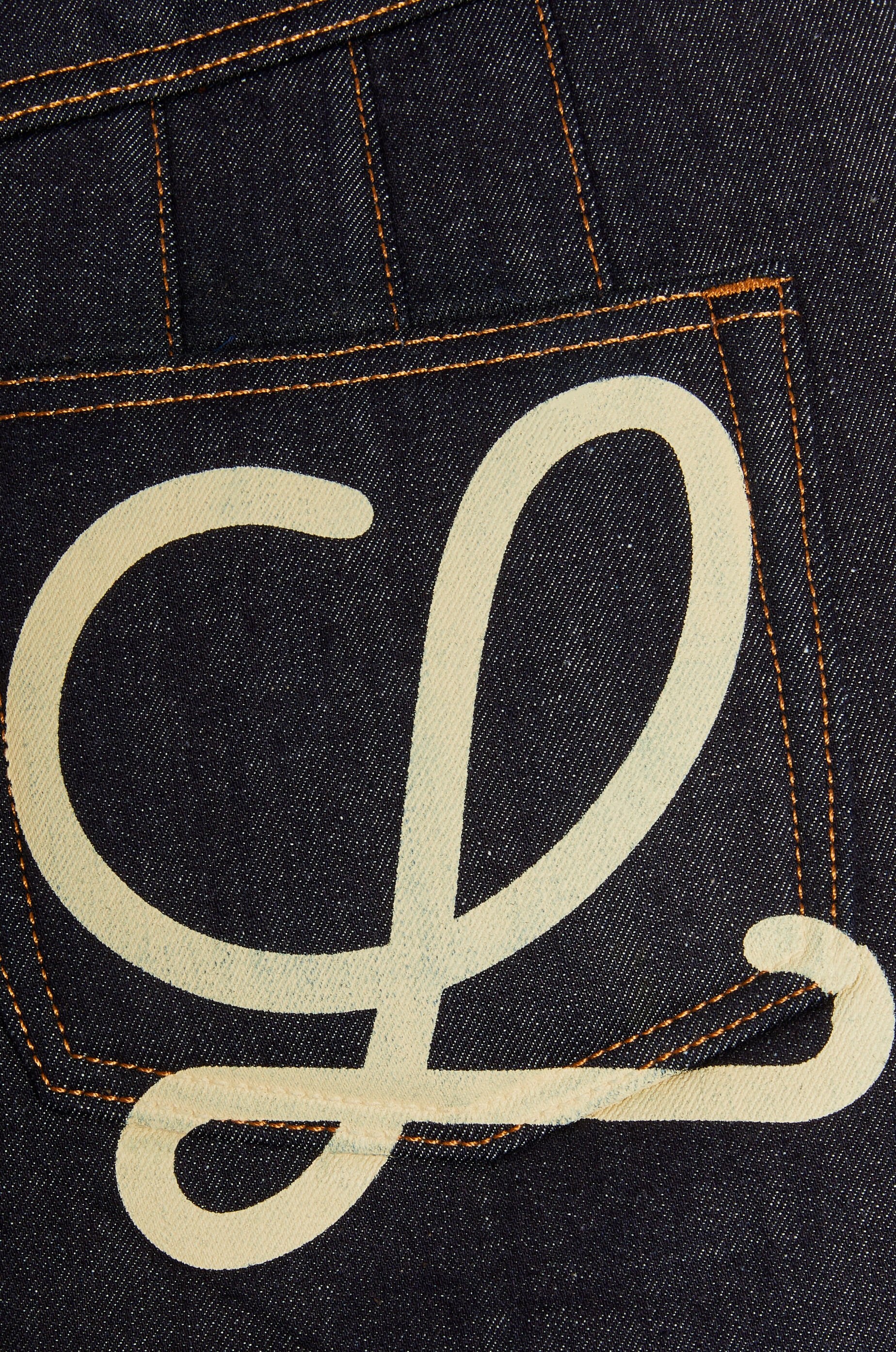 Curved mini skirt in denim - 3