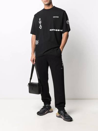 Marcelo Burlon County Of Milan folk print track pants outlook