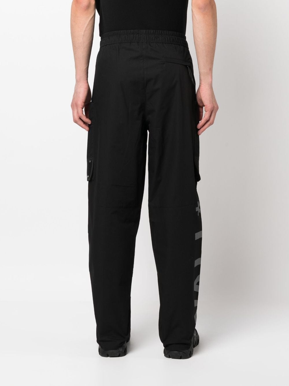 Overset Tech logo-print trousers - 4