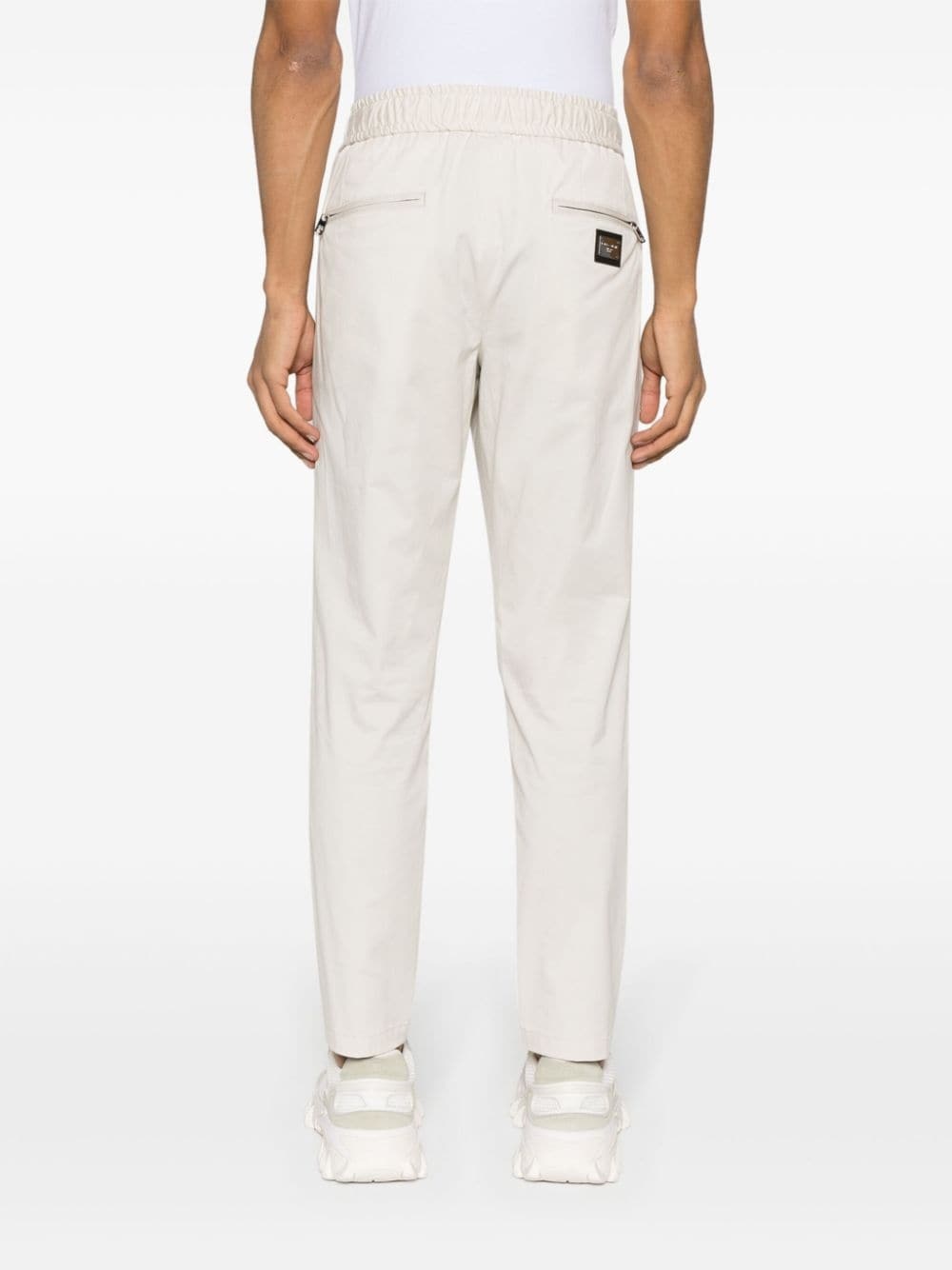 logo-plaque tapered-leg trousers - 4