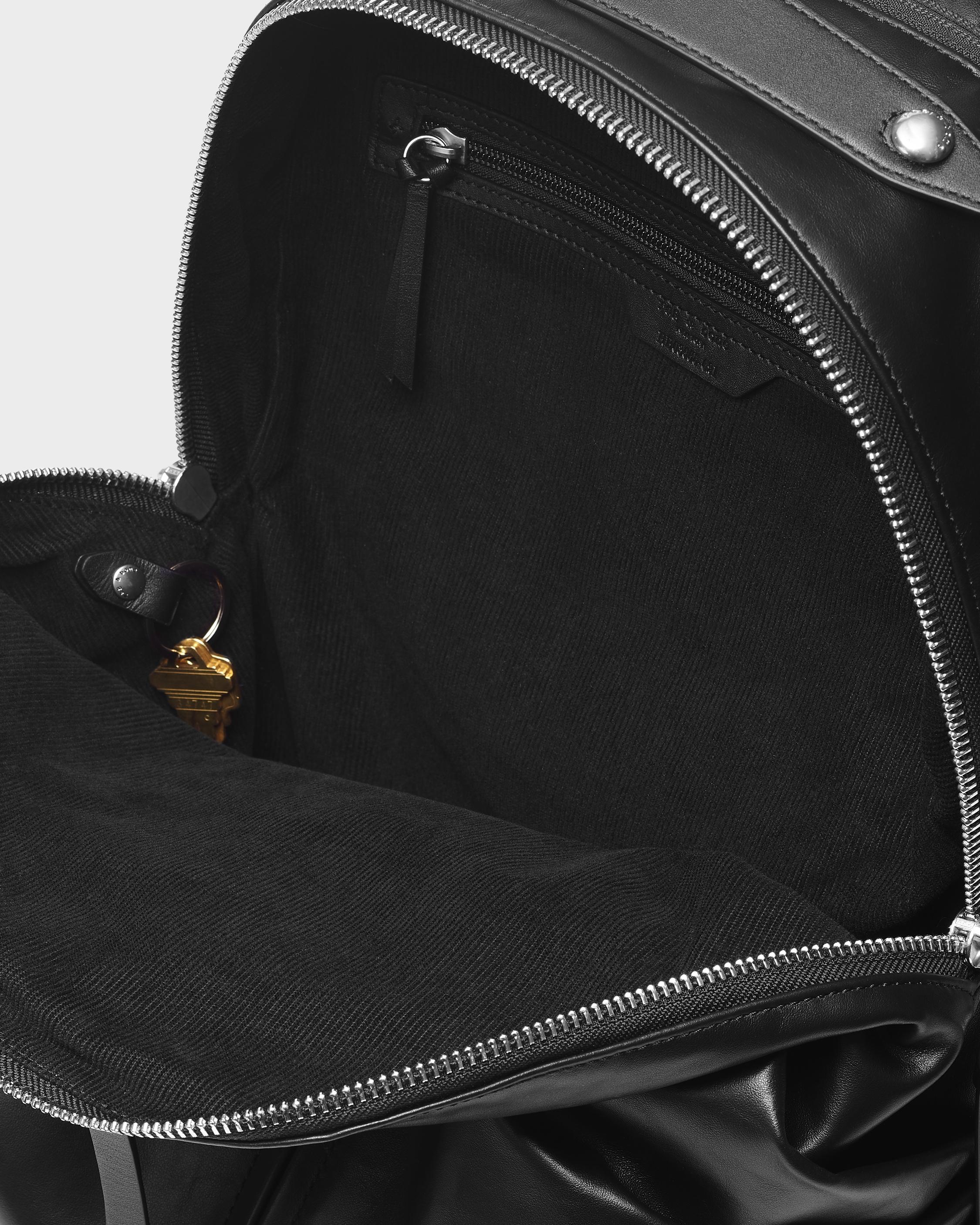 Commuter Backpack - Leather
Large Backpack - 6