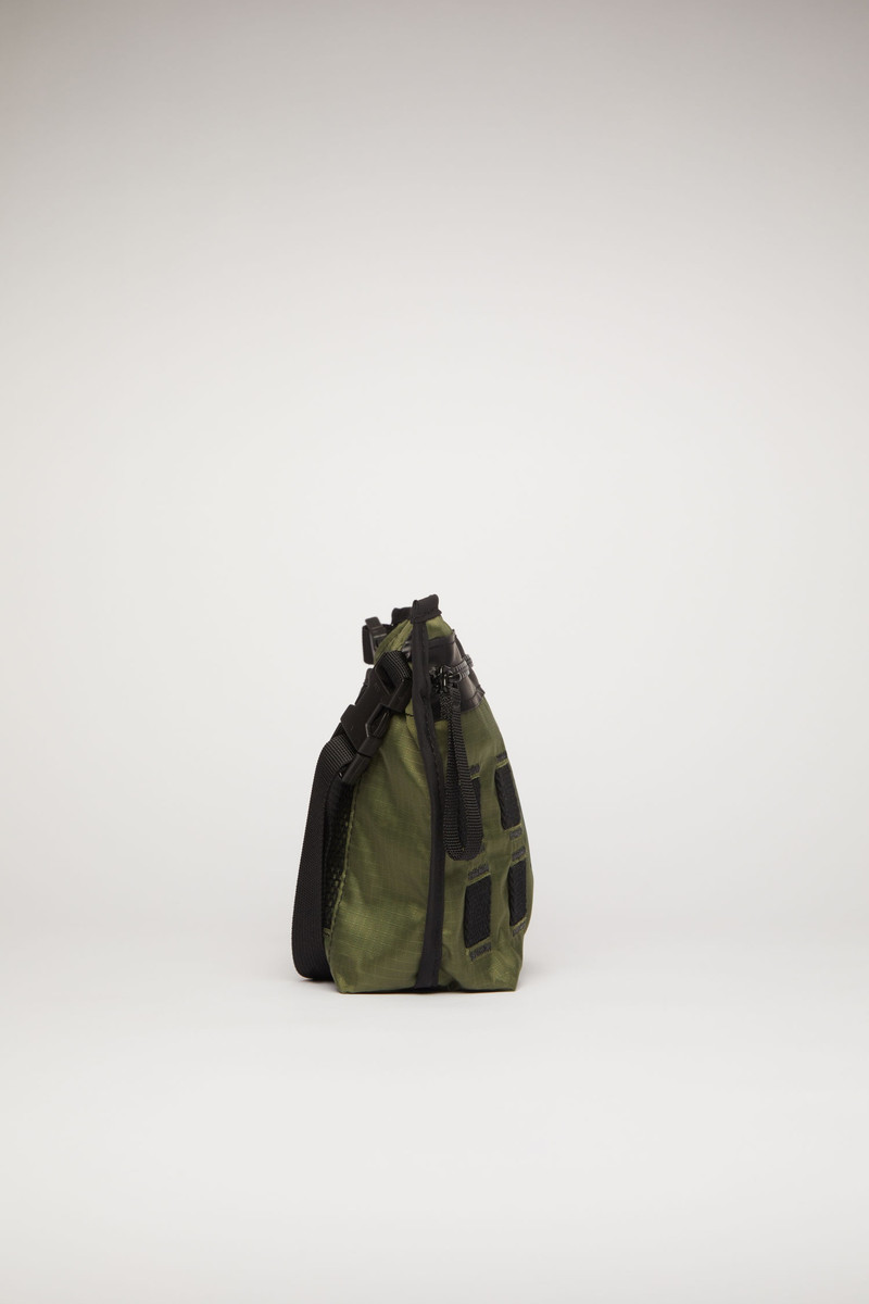 Acne Studios Logo plaque belt bag khaki green outlook