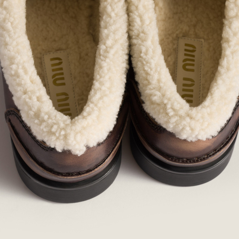 Miu Miu Bleached leather and shearling penny loafers outlook