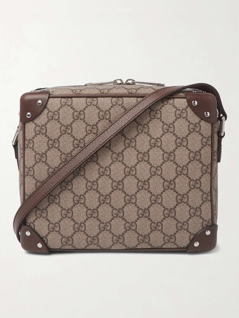 Studded Leather-Trimmed Monogrammed Coated-Canvas Messenger Bag - 1
